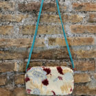 Pochette in tessuto da tappezzeria